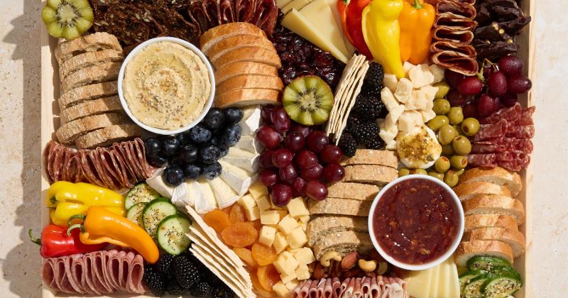 Logo of Graze Craze with the text "Charcuterie Boards & Boxes" at the bottom.