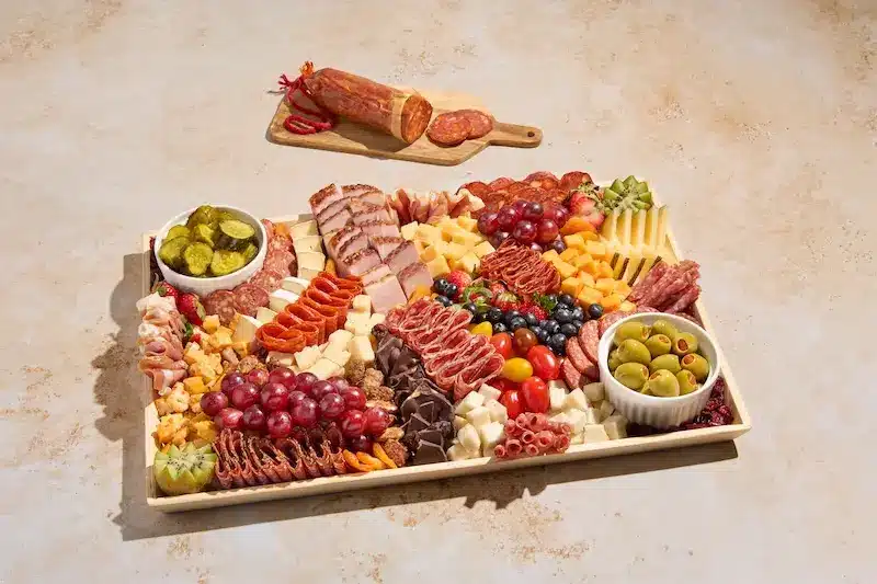 Logo of Graze Craze with the text "Charcuterie Boards & Boxes" at the bottom.